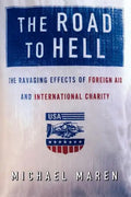 The Road to Hell: The Ravaging Effects of Foreign Aid and International Charity - Paperback