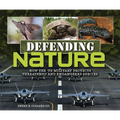 Defending Nature: How the Us Military Protects Threatened and Endangered Species - Library Binding