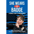 She Wears The Badge: A Woman's Guide to Empowerment - Hardcover