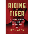 Riding the Tiger: Vladimir Putin's Russia and the Uses of War - Hardcover