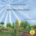 Catching the Sun: How Solar Energy Illuminates Ethiopia in Amharic and English - Paperback