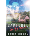 Captured in Frame - Paperback